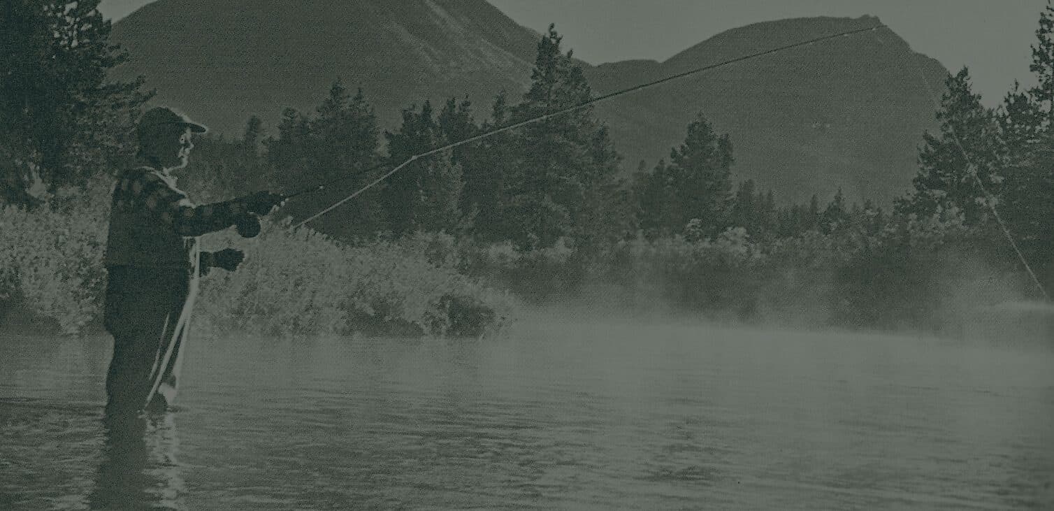 man fishing in a river