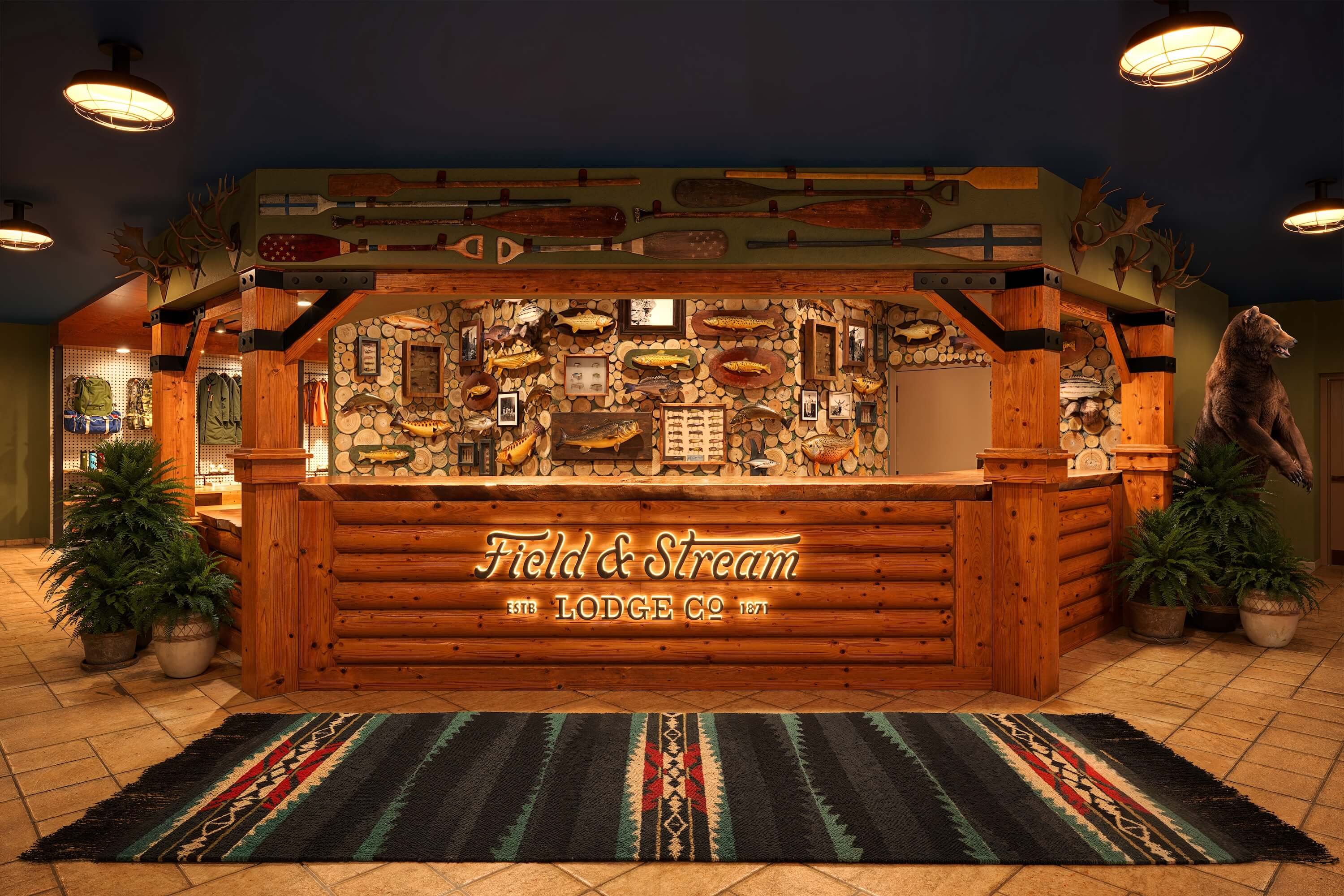 field & stream lodge co main enterance with wooden interior