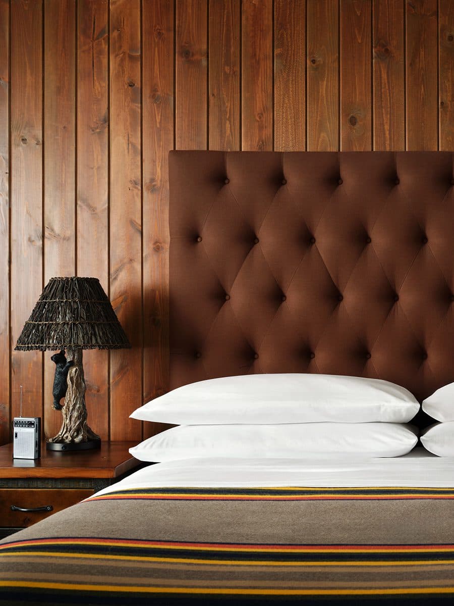 The King Suite Bed and side table